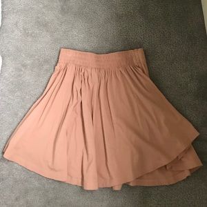 Light pinkish/orange skater skirt